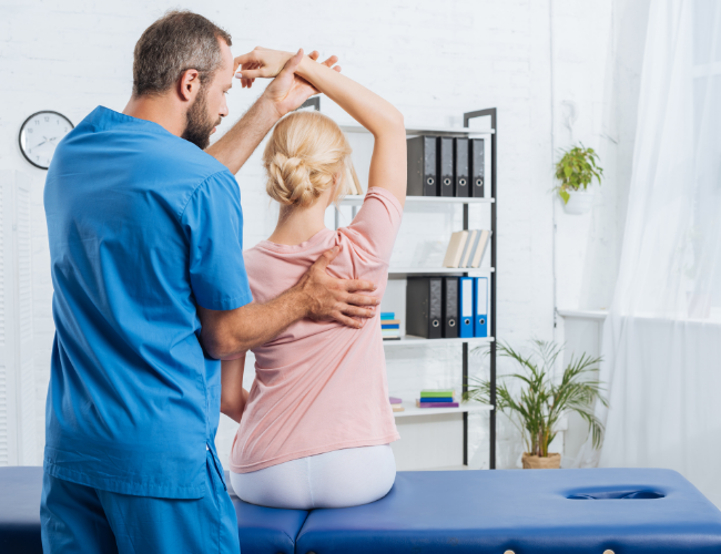 Athlete receiving physical therapy at Pro Vita